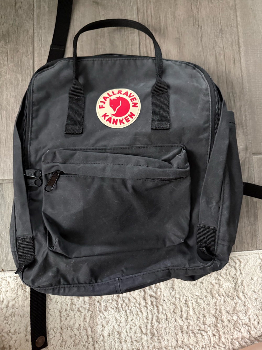 Fjallraven Kånken Classic Backpack in Black with Red Logo